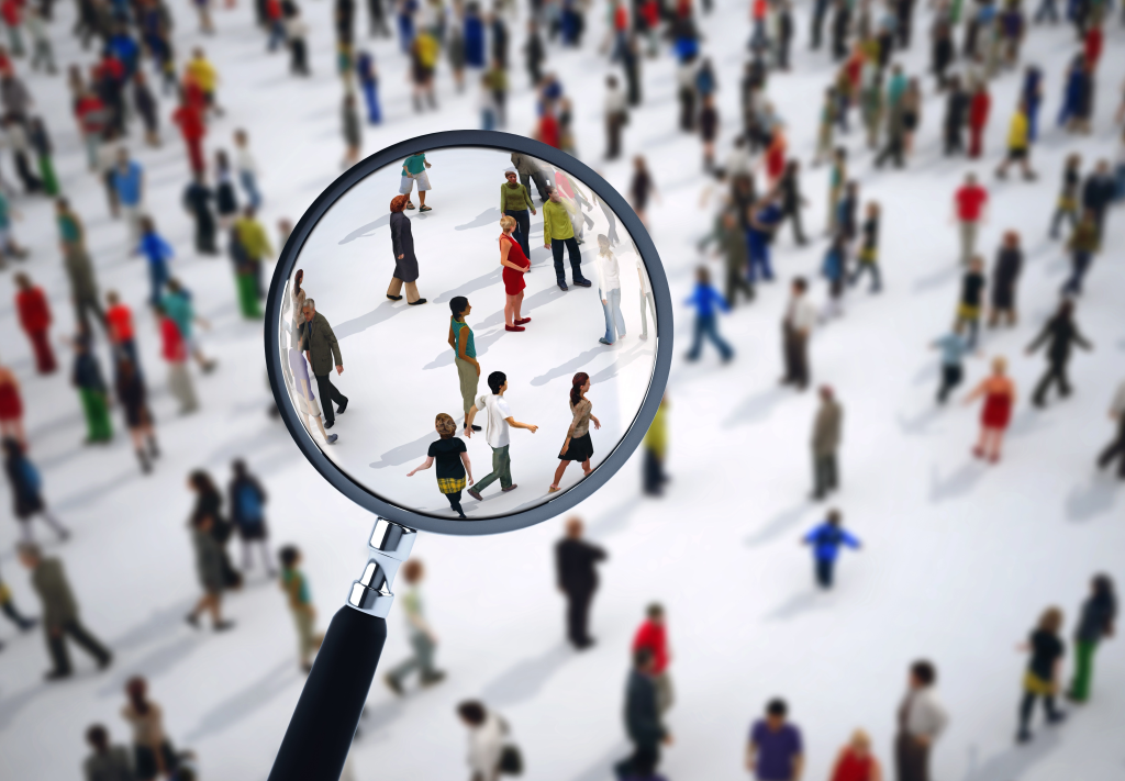 Magnifying glass on a large group of people. 3D Rendering